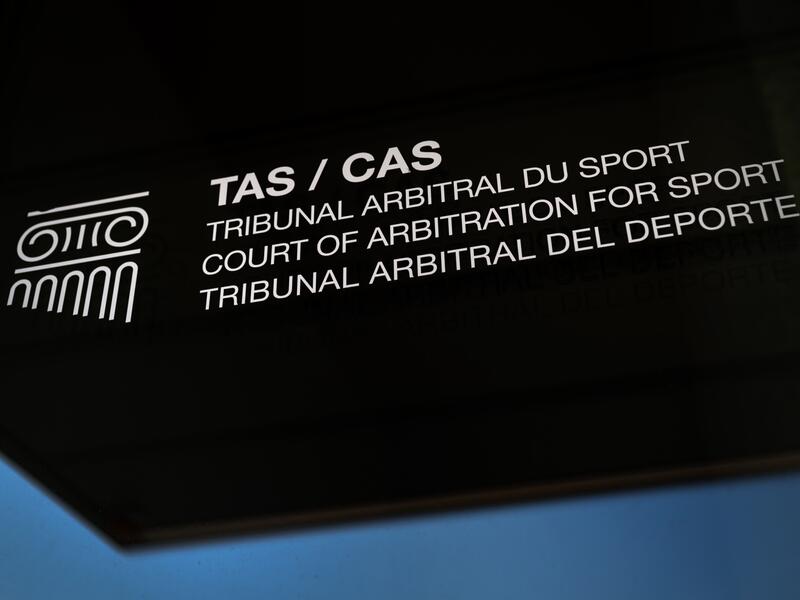 A picture taken on March 21, 2022 shows a sign and logo of the Court of Arbitration for Sport at their new headquarters in in Lausanne, western Switzerland. The Russian football team remains excluded from the qualifying play-offs for the 2022 World Cup at the end of March after the Court of Arbitration for Sport on March 18, 2022 rejected the Russian Federation's request to suspend Fifa's sanctions. (Photo by Fabrice COFFRINI / AFP)
