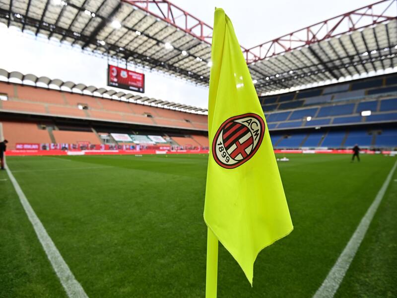 he logo of AC Milan is pictured on a corner flag prior to the Italian Serie A football match AC Milan vs Sassuolo at the San Siro stadium in Milan. AC Milan announced that its current owners, investment fund Elliot Advisors, have agreed to sell the newly-crowned Italian A champions to rival fund RedBird for 1.2 billion euros ($1.3 billion). (Photo by MIGUEL MEDINA / AFP) 