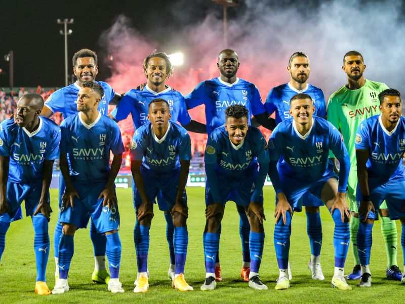 The starting eleven of Saudi Arabia's Al-Hilal pose for a group photo before the start of their 2023 Arab Club Champions Cup group B football match against Libya's Al-Ahli Tripoli at the Prince Sultan bin Abdul Aziz Stadium in Abha on July 27, 2023. (Photo by AFP)