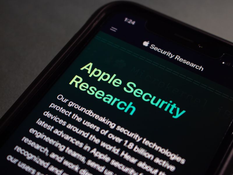 Apple Security Research website on an iPhone screen