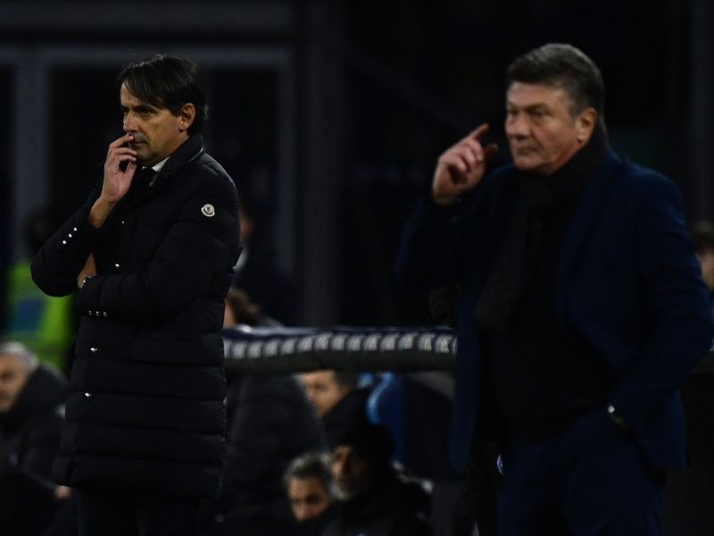 Inter Milan's Italian coach Simone Inzaghi (L) and Napoli's Italian head coach Walter Mazzari gesture during the Italian Serie A football match between Napoli and Inter Milan on December 03, 2023 at the Diego Armando Maradona stadium in Naples. (Photo by Filippo MONTEFORTE / AFP)