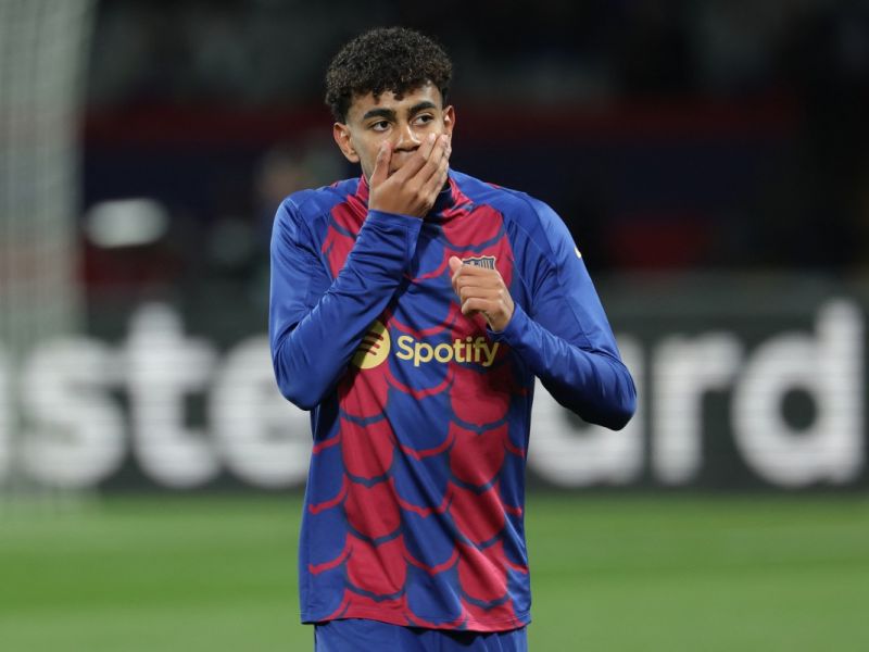 Barcelona's Spanish forward #27 Lamine Yamal warms up prior to the UEFA Champions League last 16 second leg football match between FC Barcelona and SSC Napoli at the Estadi Olimpic Lluis Companys in Barcelona on March 12, 2024. (Photo by LLUIS GENE / AFP)