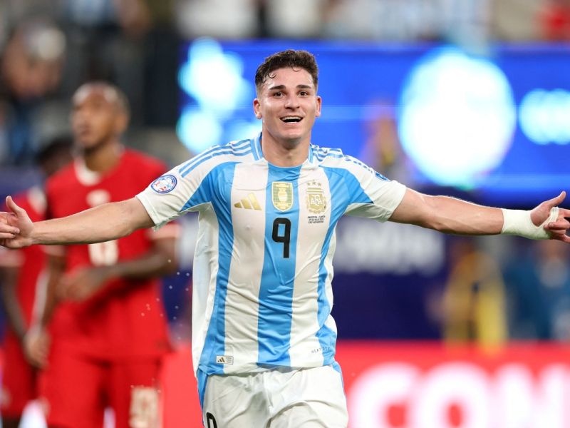 Argentina's forward #09 Julian Alvarez celebrates scoring his team's first goal during the Conmebol 2024 Copa America tournament semi-final football match between Argentina and Canada at MetLife Stadium, in East Rutherford, New Jersey on July 9, 2024. (Photo by CHARLY TRIBALLEAU / AFP)
