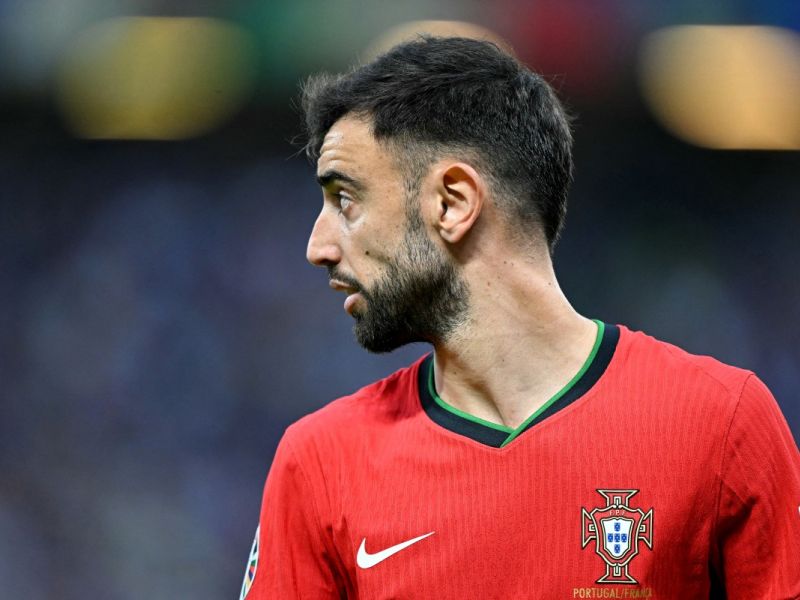 Portugal's midfielder #08 Bruno Fernandes looks on during the UEFA Euro 2024 quarter-final football match between Portugal and France at the Volksparkstadion in Hamburg on July 5, 2024. (Photo by PATRICIA DE MELO MOREIRA / AFP)