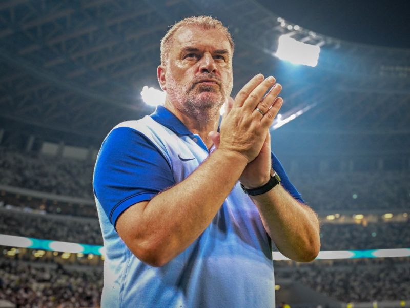 Tottenham's manager Ange Postecoglou celebrates team's victory after an international club friendly football match between Tottenham Hotspur FC and Vissel Kobe at the Japan National Stadium in Tokyo on July 27, 2024. (Photo by Yuichi YAMAZAKI / AFP)