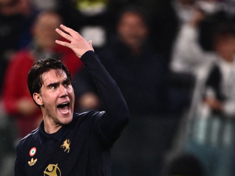 Juventus’ Serbian forward #09 Dusan Vlahovic celebrates after the own goal of Lazio’s Spanish defender #34 Mario Gila during the Italian Serie A football match between Juventus and Lazio, at the Allianz Stadium, in Turin on October 19, 2024. (Photo by MARCO BERTORELLO / AFP)