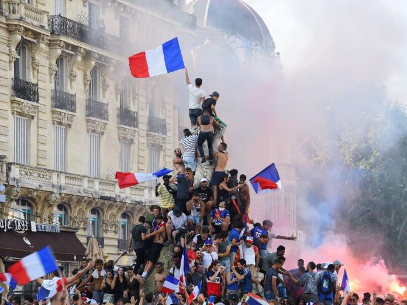 France supporters celebrate after France won the Russia 2018 World Cup final football match between France and Croatia, in Montpellier, southern France, on July 15, 2018. 
Sylvain THOMAS / AFP