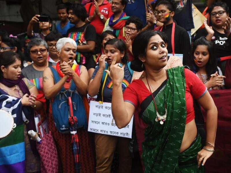 Indian members and supporters of the lesbian, gay, bisexual, transgender (LGBT) community celebrate the Supreme Court decision to strike down a colonial-era ban on gay sex, in Kolkata on September 6, 2018. 
Dibyangshu SARKAR / AFP