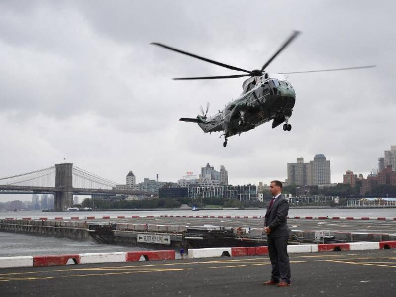 Marine One, carrying US President Donald Trump, lands in lower Manhattan in New York on September 23, 2018. Trump is in New York for the UN General Assembly. 
MANDEL NGAN / AFP