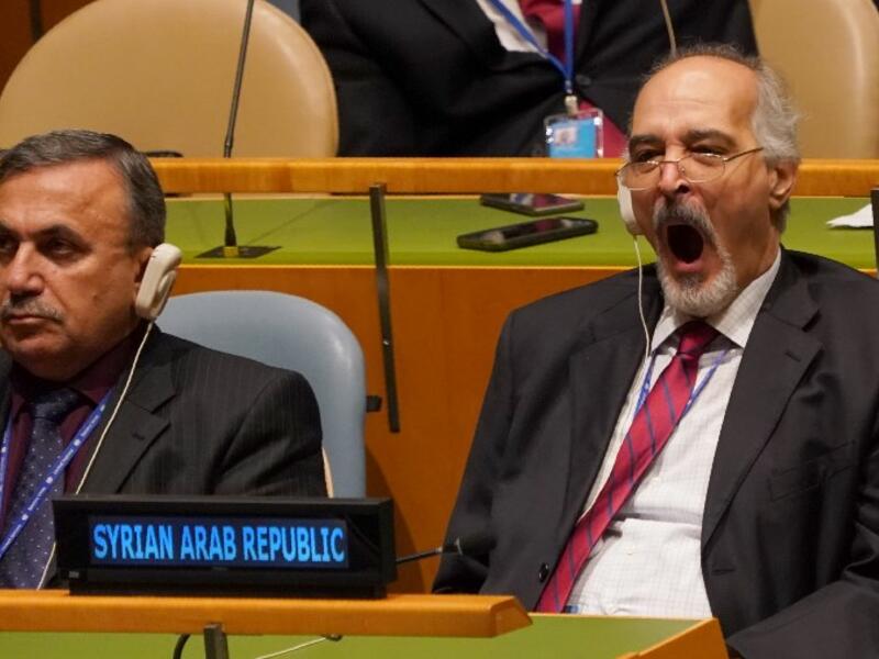 Syrian Ambassador to the UN Bashar Jaafari yawns as he attends the General Debate of the 73rd session of the General Assembly at the United Nations on September 25, 2018 in New York. 
Don EMMERT / AFP