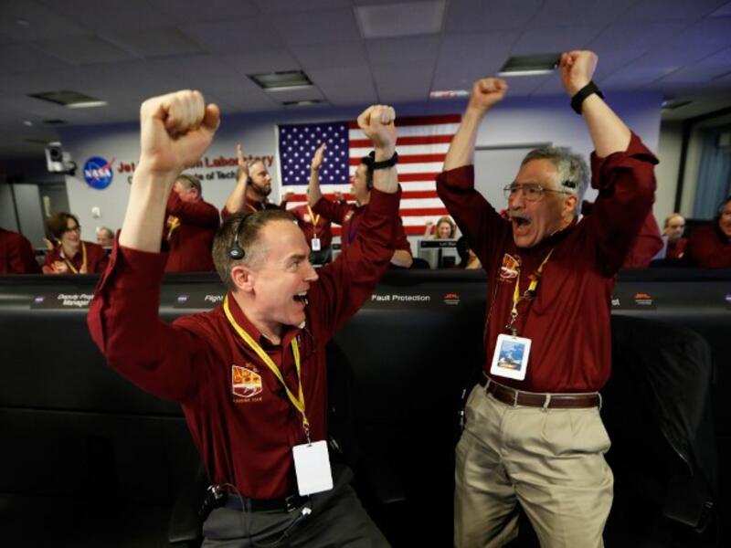 Cheers and applause erupted at NASA's Jet Propulsion Laboratory as a $993 million unmanned lander, called InSight, touched down on the Red Planet and managed to send back its first picture.
Al SEIB / POOL / AFP