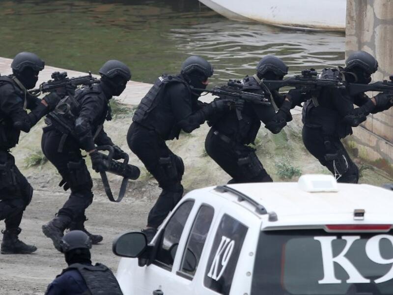 Members fo the UAE Armed forces perform a military drill during the opening of the International Defence Exhibtion and Confrence at the Abu Dhabi National Exhibtion Centre on February 17, 2019. 
AFP