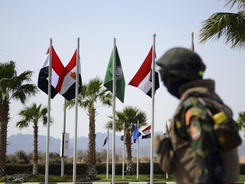 A member of the Egyptian Special Forces stands guard outside the International Congress Centre on February 24, 2019, ahead of first joint European Union and Arab League summit in the Egyptian Red Sea resort of Sharm el-Sheikh. 
Mohamed el-Shahed / AFP