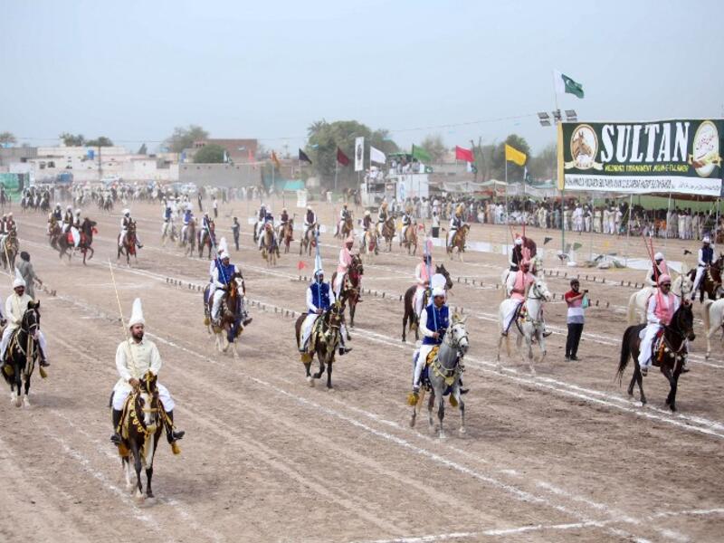 Traditional drumbeats and melodious shahnai are drowned out by thundering hoofs in the small Pakistani city of Tulamba, as riders pound down a dusty track seeking world record glory in the ancient sport of tent-pegging.

SS MIRZA / AFP