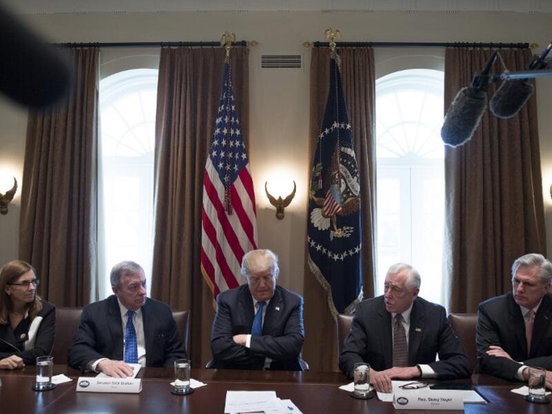 US President Donald Trump (C) listens during a meeting with bipartisan members of the Senate on immigration at the White House in Washington, DC, on Jan. 9, 2018 (JIM WATSON / AFP)