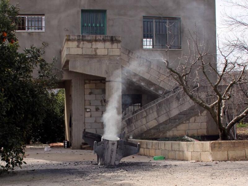 A picture taken on February 10, 2018, shows the remains of a missile that landed in the southern Lebanese village of Kaoukaba, near the border with Syria, after Israel's military attacked 12 Syrian and Iranian targets inside Syria on in what it described as "large-scale" raids following an exchange of fire earlier in the day.
(ALI DIA / AFP)