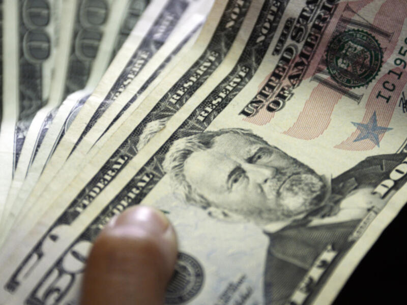 Counting the money. It was a nice surprise for Virginia man who bought the lottery ticket and stashed it away for a month only to find out he had become an overnight millionaire. (AFP/File Photo)	