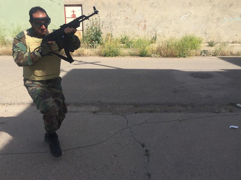 Christians - Various Christian paramilitary groups are on frontlines north of Mosul too, and hope to help retake Assyrian villages from Daesh. This soldier in the Nineveh Plain Forces is one of them.




