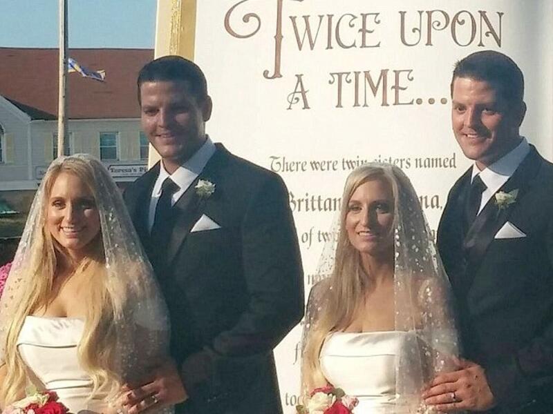 The couples tied the knot side-by-side in a ceremony that was themed 'Twice Upon a Time' (Facebook)