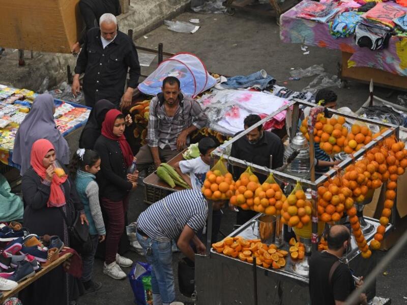 Election fever downmarket, people take to buying oranges (AFP/File Photo). 
