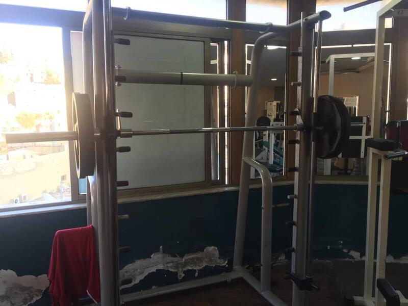 Squat rack pulley bench