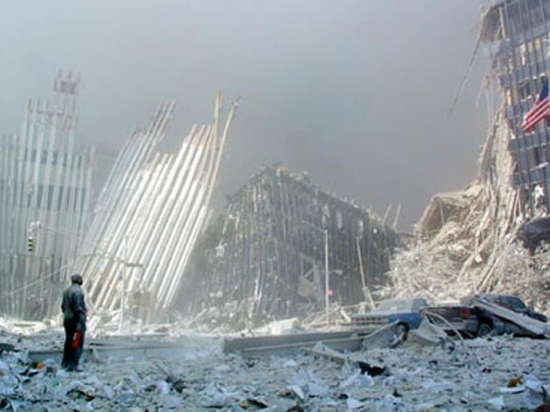 A man stands amid the dust and rubble of the World Trade Center following the al-Qaeda coordinated attacks on September 11, 2001. (AFP/Doug Kanter)
