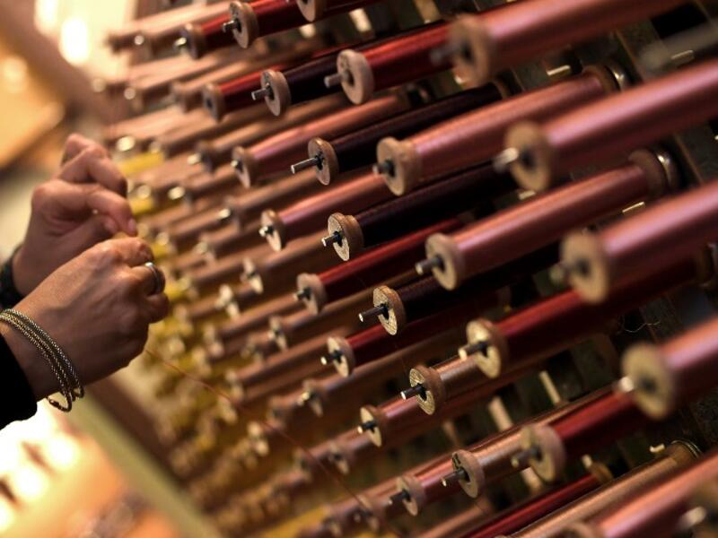 This picture  shows a close-up view of reels of thread in the laboratory of Antico setificio Fiorentino ancient silk factory in Florence. 
Tiziana FABI / AFP