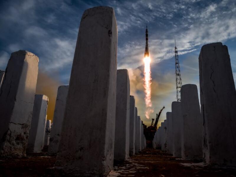 A Soyuz MS-11 rocket carrying Russian, American and Canadian astronauts takes off from the Baikonur Cosmodrome on December 3, 2018 before reached orbit later, the first manned mission since a failed launch in October. 
Kirill KUDRYAVTSEV / AFP