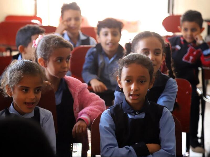 Children attend a music class at the Al-Nawras school in Taez, Yemen's third city, in the country's southwest
AHMAD AL-BASHA / AFP