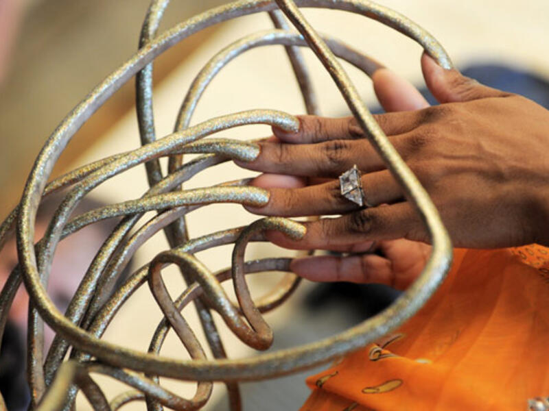 American Lee Redmond nearly 30 years to grown her nails out to the record-holding 28 feet, 4.5 inches in February 2008. The longest single nail was her right thumb, which reached to 2 feet, 11 inches. (AFP/ File Photo)