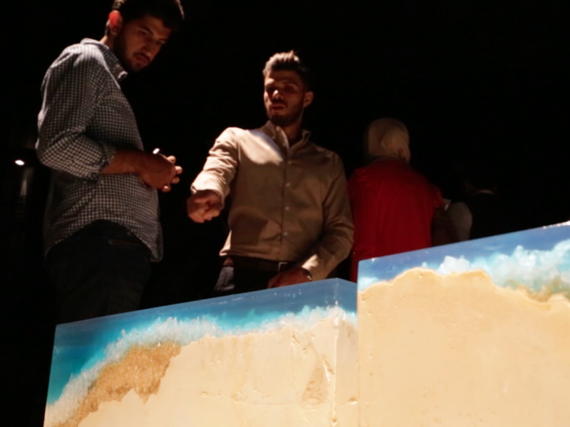 Architect and designer Tarek Hreish discusses his project which utilizes raw materials for craftsmanship, blending traditional and modern elements. (Al Bawaba/Salim Essaid) 