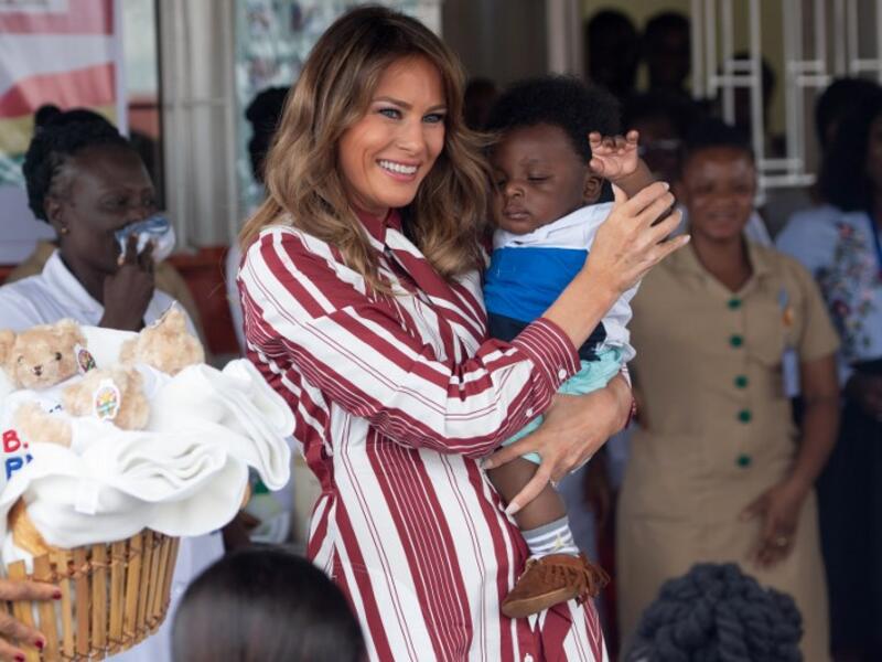 US First Lady Melania Trump holds a baby during a visit to the Greater Accra Regional Hospital in Accra, on October 2, 2018. (SAUL LOEB / AFP)

