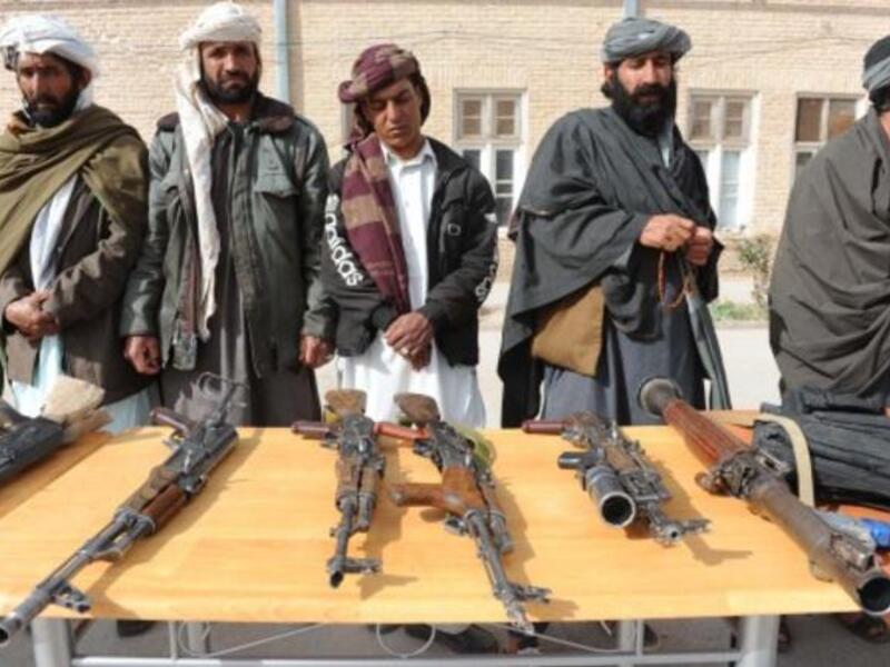 Former Taliban fighters hand over their weapons (File photo used for illustrative purposes)