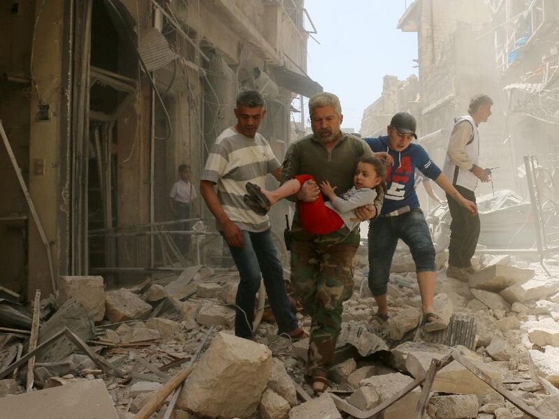 At least four children were killed when shells fired by militants hit a school in the government-held area of Aleppo.  (AFP/File) 