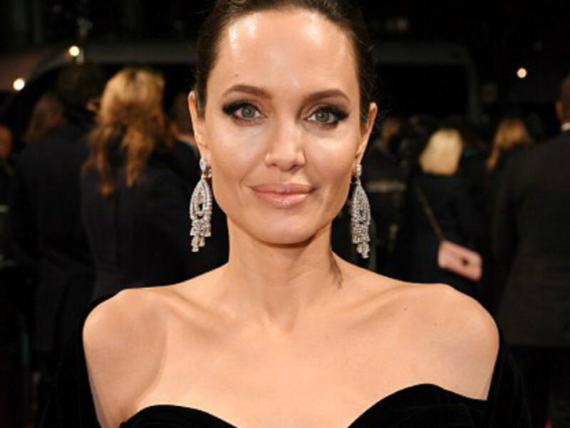 Angelina and Jennifer's choice of wearing black gowns saw them standing in solidarity with the Time's Up movement, which has been a dominant theme at Hollywood awards shows this season. (Source: David Fisher - Shutterstock)