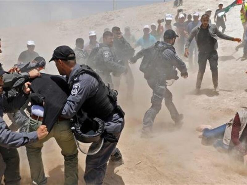 Protesters clash with Israeli police in the Palestinian Bedouin village of Khan al-Ahmar in the occupied West Bank. (AFP/File)