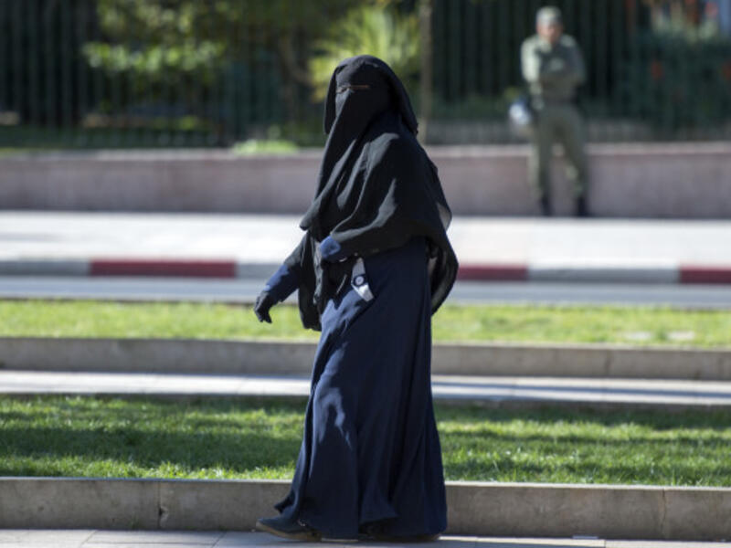 Government lawyers expect the law to prevail because it requires people to show their faces for identification purposes (AFP/File)