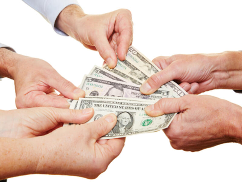 "Only lend up to the amount of money you’d feel comfortable placing on the table in a game of roulette or craps." (Shutterstock)