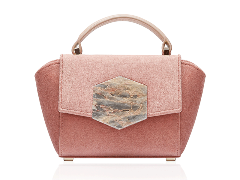 Bakari is a Spanish handbag brand by designer Carmen Lopez with the purpose of protecting handmade production techniques.  Bakari utilizes sustainable materials including upcycled marble and wood from refineries, and upcycled silver.