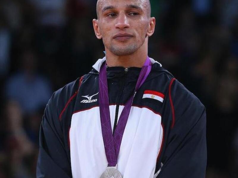 المصارع المصري كرم جابر: عاد النجم المخضرم ليظفر بفضية 84 كغم في المصارعة الرومانية بعد إنجازه التاريخي في أثينا 2004 وذهبية وزن 96 كغم ليعيد إلى مصر جزءاً من ابتسامتها.