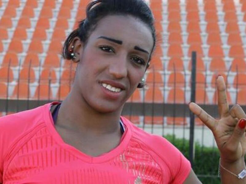 Ghafran Muhammad is a Syrian athlete sprinting to the finish