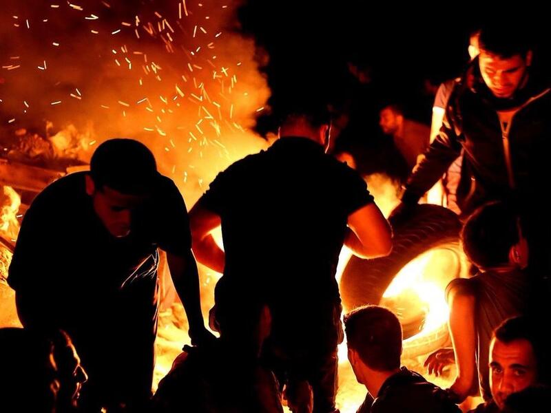 A Palestinian protesters from a group calling themselves the "night confusion units"  (Twitter/Fadi Thabet)