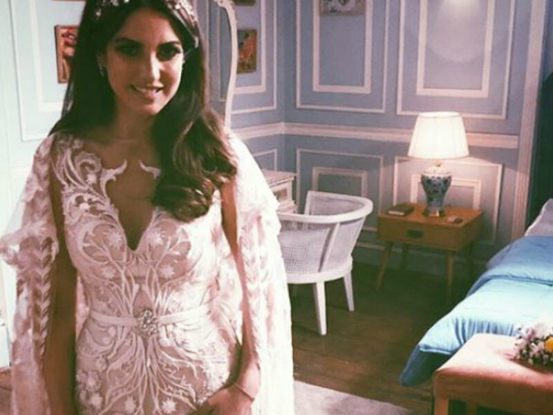 Tunisian beauty Dorra put on a cape dress designed by Egyptian designer Hany Elbehairy in Nasr Al Said Saids Eagle series 