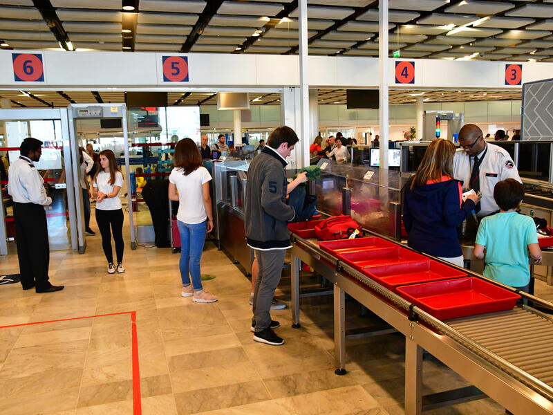 Last month the US and UK banned passengers from carrying on electronics larger than a cell phone on direct flights from the Middle East. (Shutterstock)