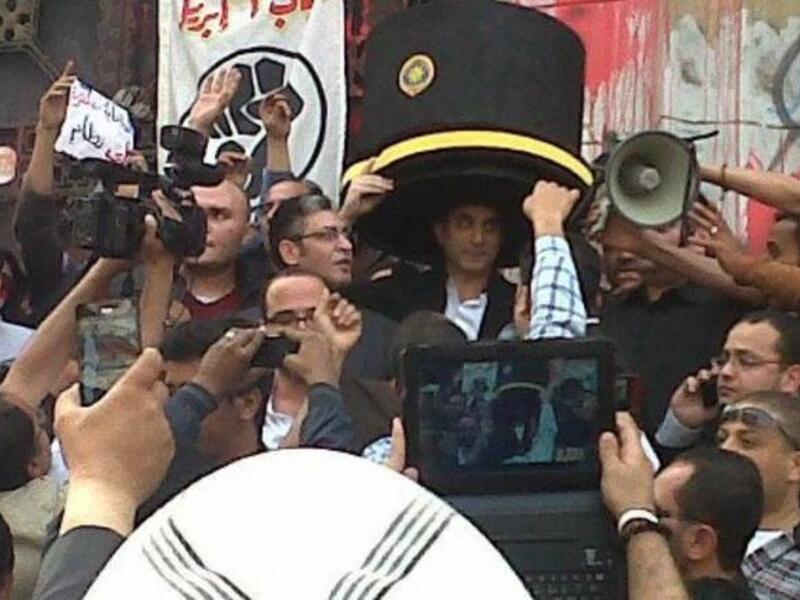 Bassem Youssef arrives at the prosecutor-general's office on Sunday (11FebFront Photo)