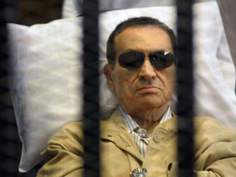 Egypt's former president inside a barred cage in the police academy courthouse in Cairo, Egypt. [alahram]
