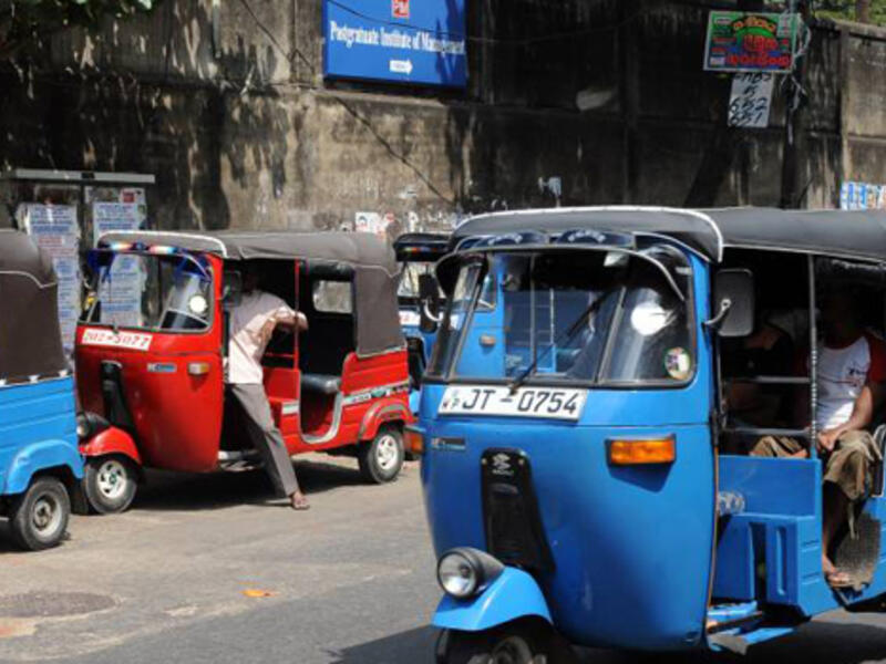 A Tuk tuk driver offering transport services. (AFP/ File)