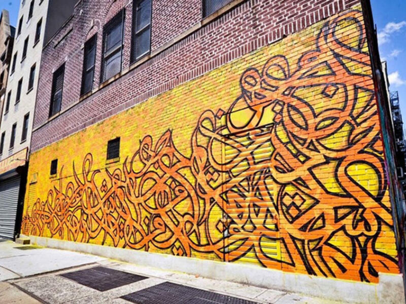 eL Seed graffiti wall Arab artist New York