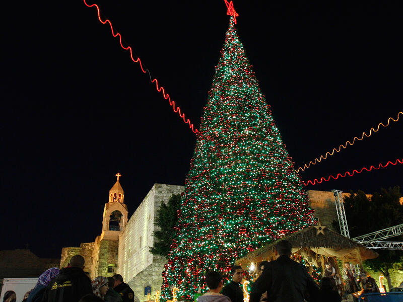 Bethlehem goes all out for Dec. 25. The small city (pop. 25,000) erects a 50-foot Christmas tree in Manger Square, near the Church of the Nativity, where Jesus was born. Holiday cheer gets mixed with a healthy dose of nationalism: the tree is usually lit up with green, red and white lights to match the Palestinian flag.