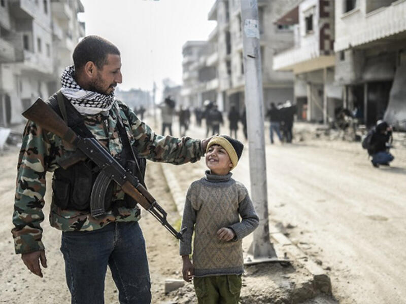 Kobani father son